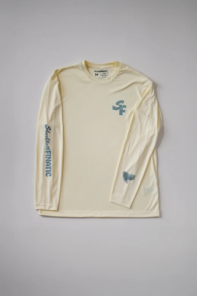 butter yellow long-sleeve performance with tiger shark tooth design