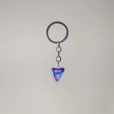 1" keychain featuring a megalodon shark tooth in a rainbow color with broken holographic design