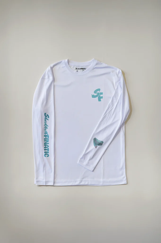 white long-sleeve performance shirt with tiger shark tooth design